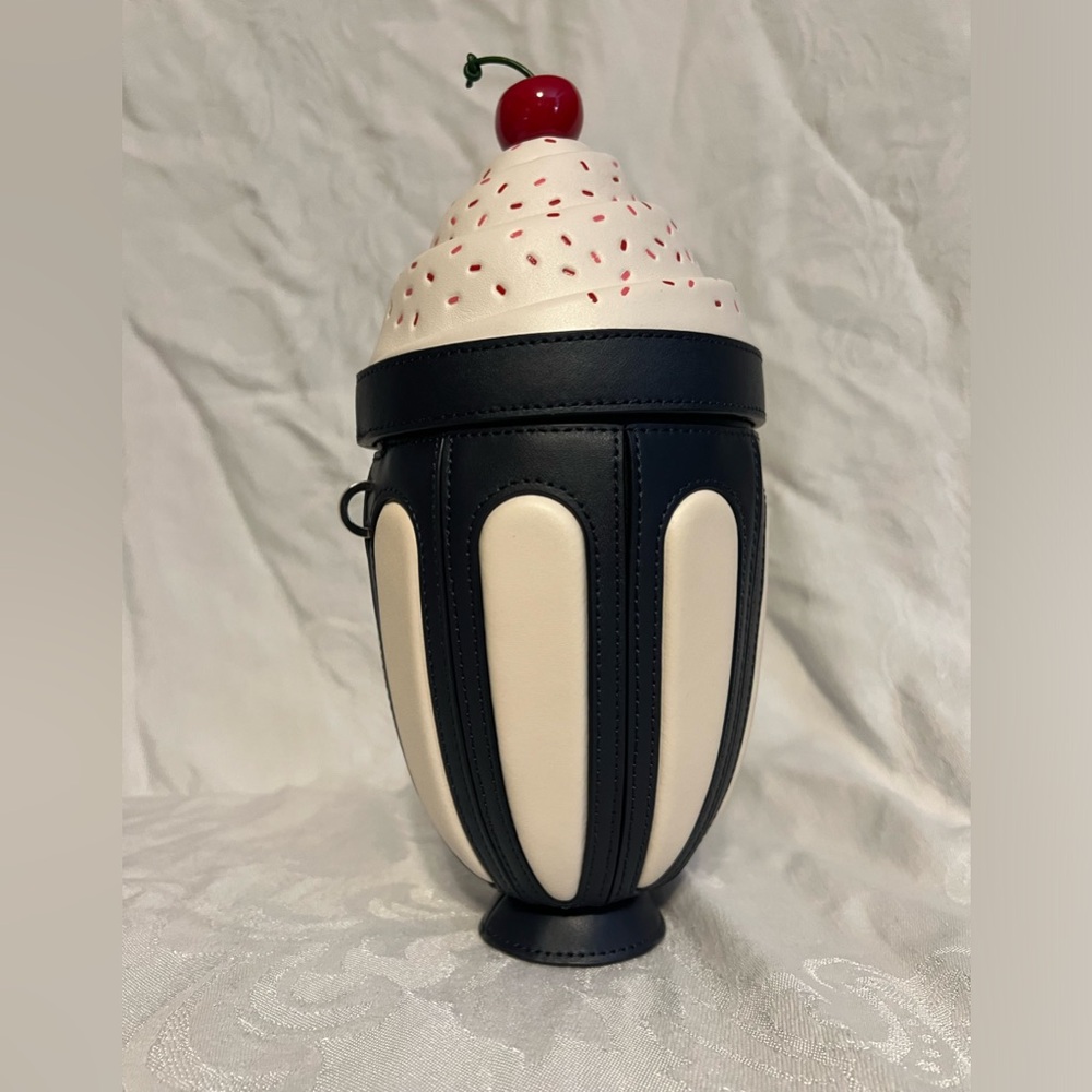 Kate Spade “Sundae Crossbody Bing” Old school soda fountain duplicated to match.